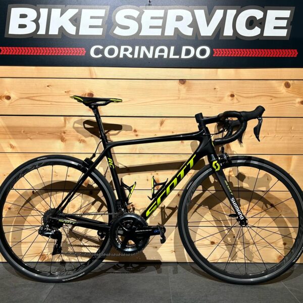 bicicletta da corsa Scott RC nera e gialla con freni a disco, esposta al Bike Service Corinaldo